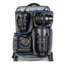 Camera backpack with Nikon camera and lenses on a white background