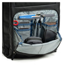 Open backpack showing organized compartments with items inside on a white background