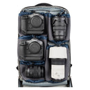 Camera backpack with Canon cameras and lenses inside on a white background