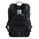 Black backpack with multiple straps and buckles on a white background