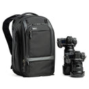 ThinkTank Walker Pro 24L camera backpack with padded laptop sleeve and tripod attachments next to professional Nikon cameras
