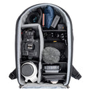 Open ThinkTank Walker Pro 24L backpack showing organized camera gear and accessories inside compartments