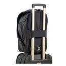 ThinkTank Walker Pro 24L camera backpack attached to luggage handle, designed for professional photographers with padded sleeves and multiple compartments