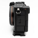 Sony a7CR camera with SmallRig plate on a white background