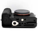 Sony a7CR camera with SmallRig plate on a white background