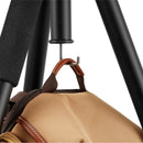 Close-up of Vanguard Vest GO 204AB tripod hook carrying a bag with black aluminum legs