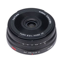 Viltrox AF 26mm f2.8 on a white background