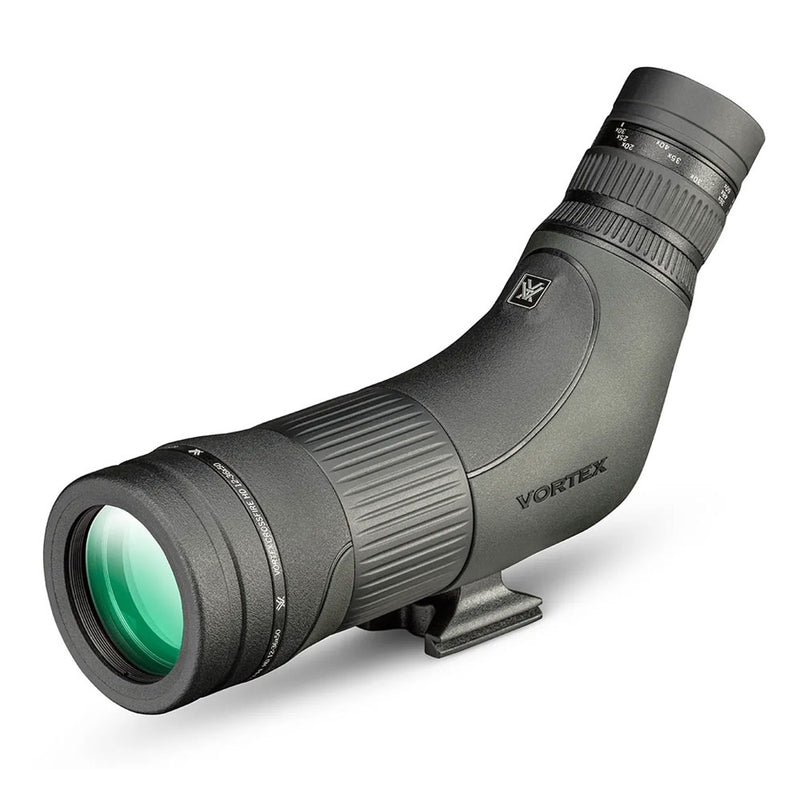 A green and black spotting scope with zoom eyepiece and tripod mount.