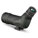 A green and black spotting scope with zoom eyepiece and tripod mount.