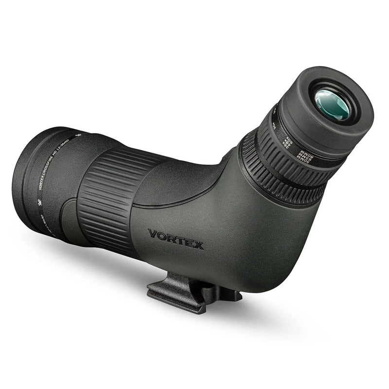 A green and black spotting scope with zoom eyepiece and tripod mount.