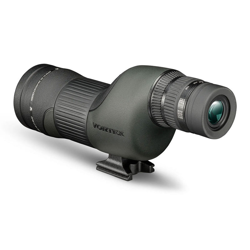 A green and black spotting scope with zoom eyepiece and tripod mount.