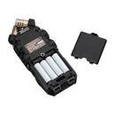 Zoom H6essential handheld recorder with battery compartment open and cover removed.