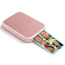 Canon IVY 2 Mini Photo Printer in pink printing colorful photo stickers with LED light bar compact portable design