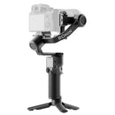 DJI RS 3 Mini handheld stabilizer with touchscreen and camera mounted compact gimbal
