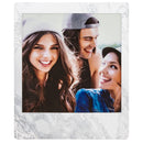 Fujifilm Instax Square Film photo of three smiling friends with vivid color and sharp details
