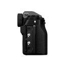 FUJIFILM X-T5 camera body side view showing card slots and textured grip in black compact design