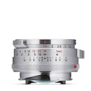 Leica Summilux-M 35mm f1.4 silver compact wide-angle camera lens with steel rim and focus lock
