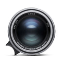 Leica Summilux-M 50mm f1.4 ASPH II camera lens front view with integrated round lens hood