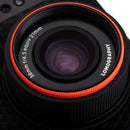 Close-up of Lomography Lomo'Instant Automat Glass camera lens with red ring and 33mm f/4.5 aperture label