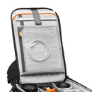 LowePro Flipside BP 400 AW III camera backpack open with laptop and camera lenses inside, showing padded compartments and mesh organizer.