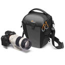 Lowepro Toploader Photo Active TLZ 50 AW camera bag with Sony Alpha 9 and 70-200mm lens, weather-resistant and compact design.