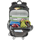MindShift Backlight 36L backpack with back panel access open, showing laptop, tablet, and organized gear compartments.