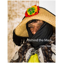 Man wearing traditional Huaconada costume with woven hat and colorful decoration for Behind the Mask book cover