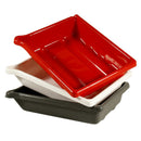 Stacked AP Developing Trays in red, white, and black made of impact-resistant plastic with spouts and grooved bottoms for photographic paper development.