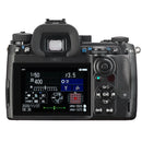 Pentax K-3 Mark III DSLR camera back view with LCD screen displaying settings and controls
