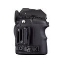 Side view of Pentax K-3 Mark III DSLR camera body showing card slots and textured grip