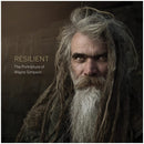 Portrait of an elderly man with long dreadlocks and a gray beard on the cover of Resilient The Portraiture by Wayne Simpson