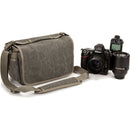 Thinktank Retrospective 6 camera bag with DSLR, lenses, and accessories in pinestone color