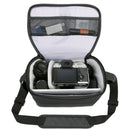 Vanguard Vesta Aspire 25 camera bag with DSLR, lenses, and accessories inside