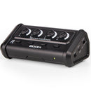 Zoom ZHA-4 Headphone Amplifier with four volume controls and mute buttons, compact design with USB-C power option.